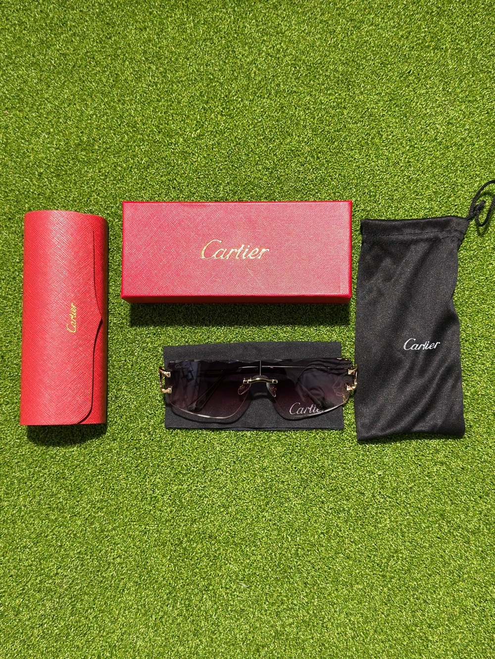 Cartier Rimless Sunglasses with Black Lenses and Gold Accents